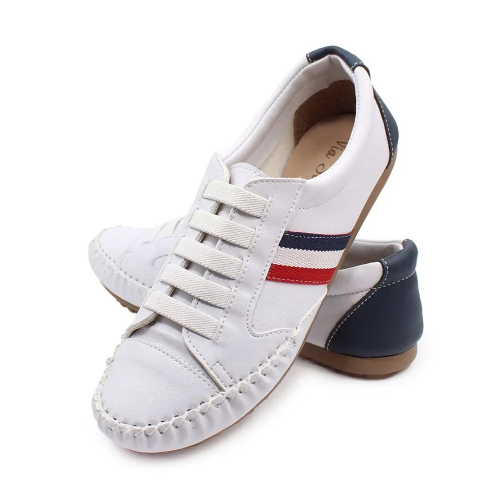 Low angle view emphasizing slip-on loafer sneaker tread and grip