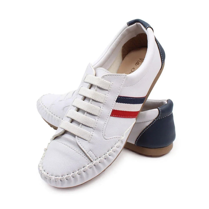 Low angle view emphasizing slip-on loafer sneaker tread and grip