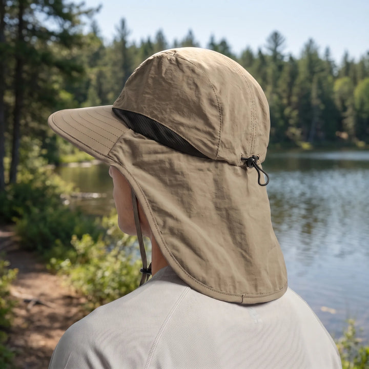 Outdoor travel sun hat featuring a protective neck flap and breathable fabric for trails