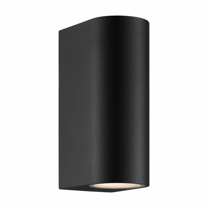 Close up of black up-down garden light fixture housing GU10 bulbs