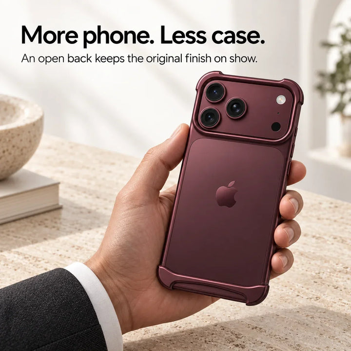 Hand holding burgundy slim aluminum iPhone bumper case showcasing open back