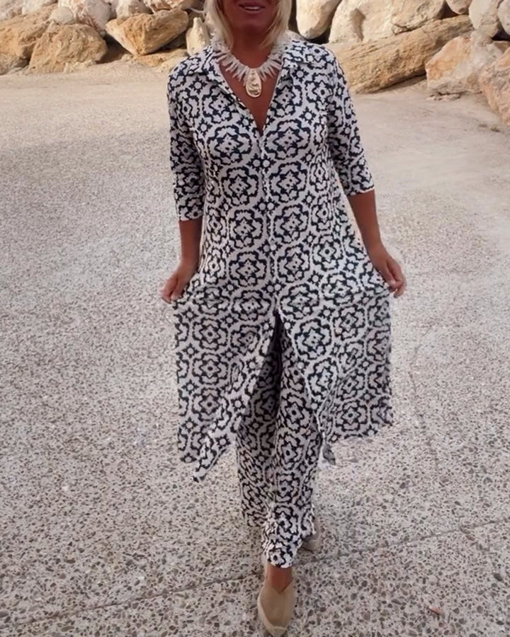Woman wearing a matching printed V-neck tunic and wide-leg pants set outdoors