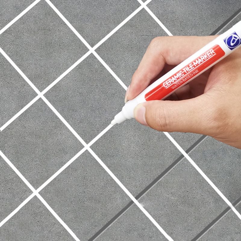 Waterproof tile grout pen for ceramic surfaces in white, home improvement tool
