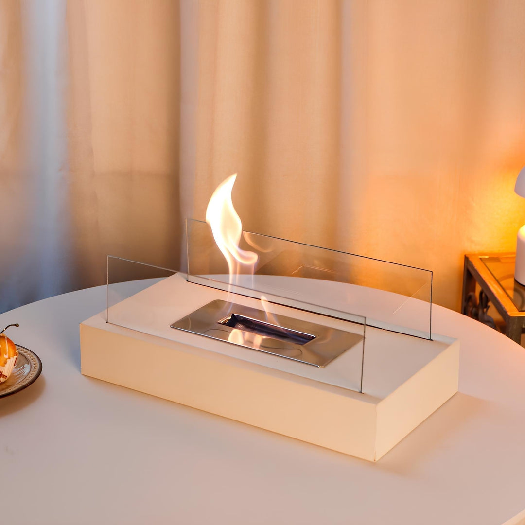 Stylized lifestyle shot of a tabletop fireplace enhancing modern patio decor
