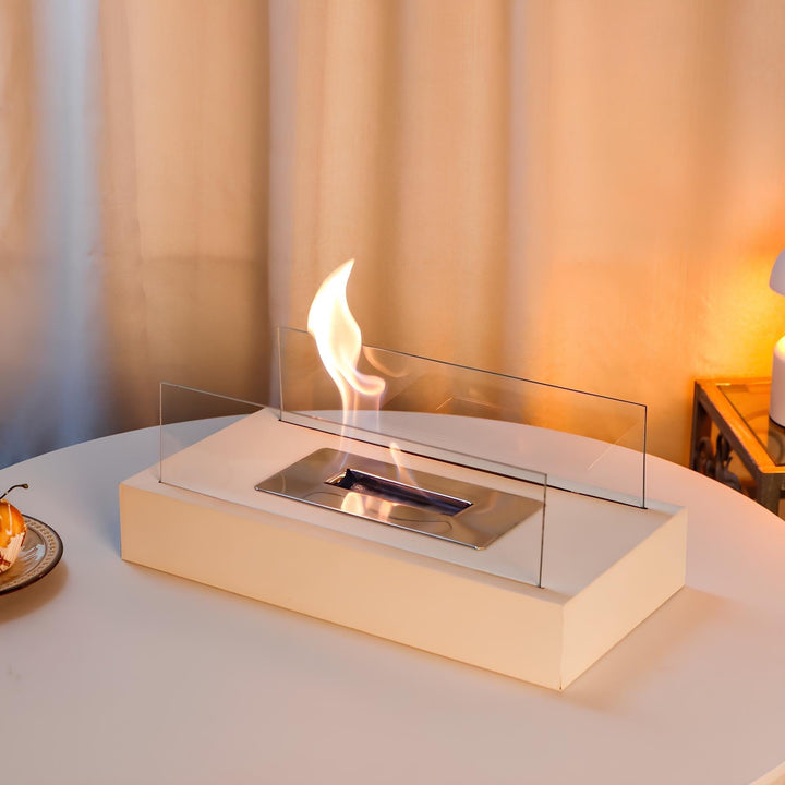 Stylized lifestyle shot of a tabletop fireplace enhancing modern patio decor