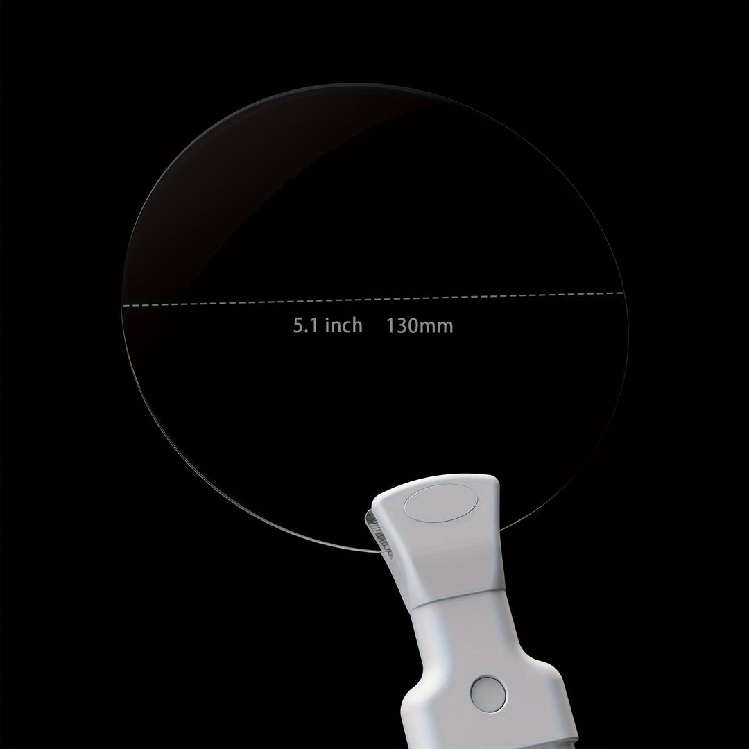 Black low vision aid magnifying glass shown from an angled perspective