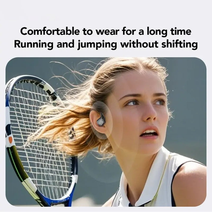 Person wearing ear-hook headphones while jogging outdoors