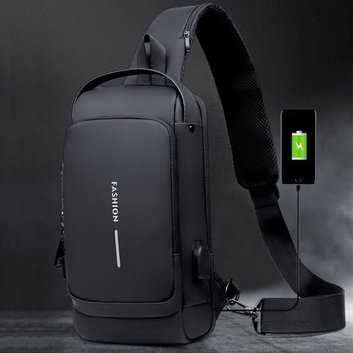 Flat lay view of the unisex crossbody bag alongside daily essentials like phone and keys.