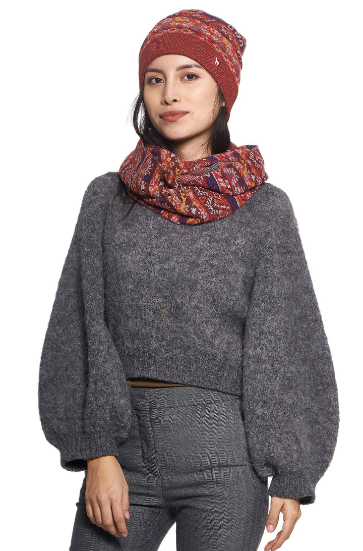 Back view of a red patterned knit beanie hat for women