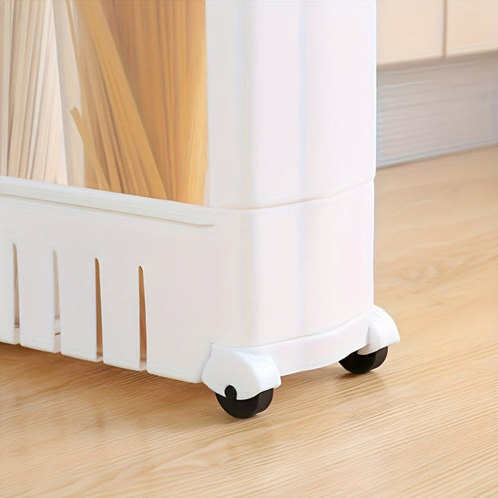 Kitchen organizer trolley loaded with spice jars and bottles on multiple levels