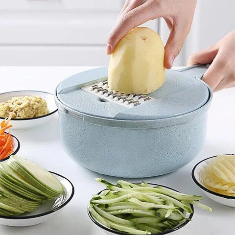 Demonstrating the 3-in-1 vegetable chopper with a potato on the slicing blade