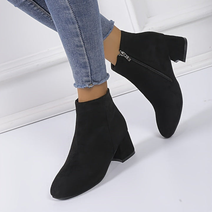Textured rubber outsole of women's slip-on chelsea boots