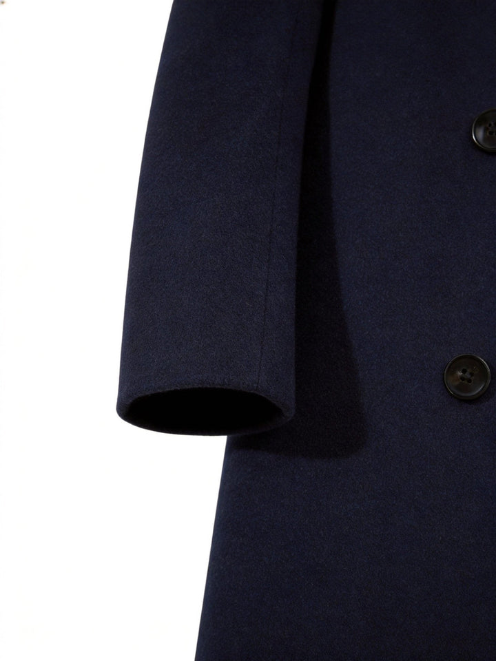 Back view of the men's formal trench coat highlighting the storm flap and center vent.