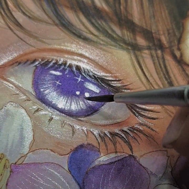 Close-up of metallic watercolour pans in a vibrant artist palette art materials