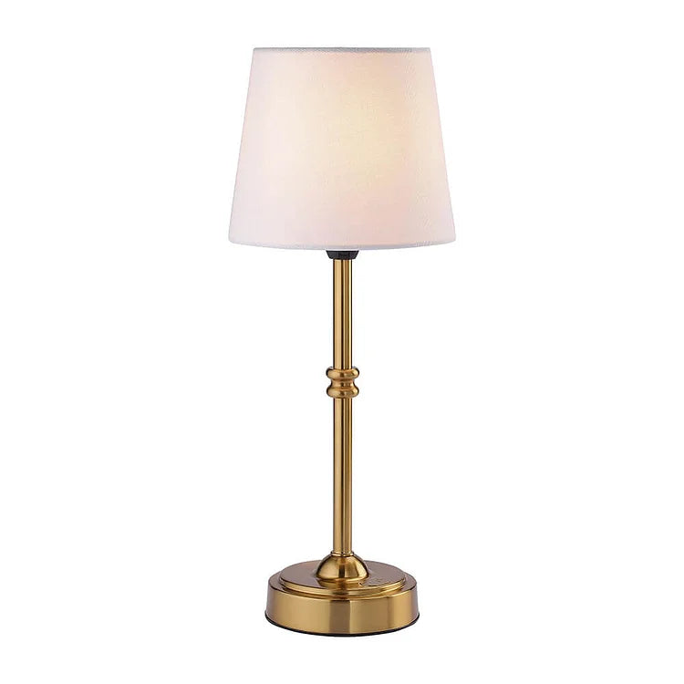 Cordless retro LED table lamp in gold finish with lit shade