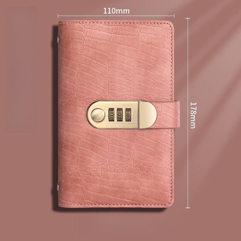 Detailed view of binder rings and cash envelopes inside the budget planner