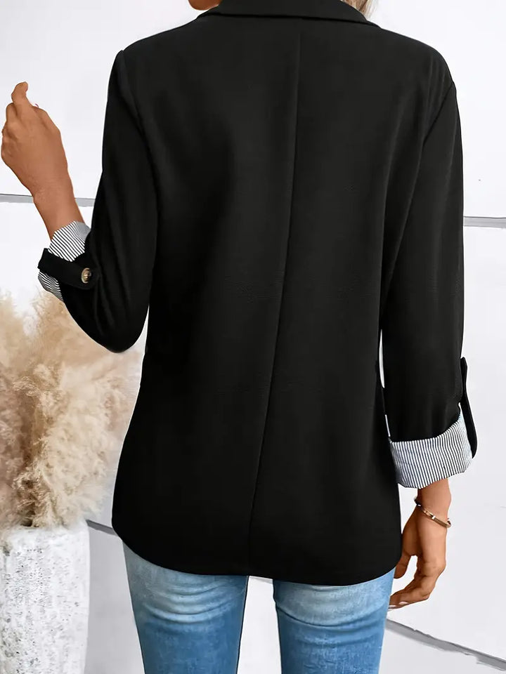 Casual chic professional outerwear button closeup