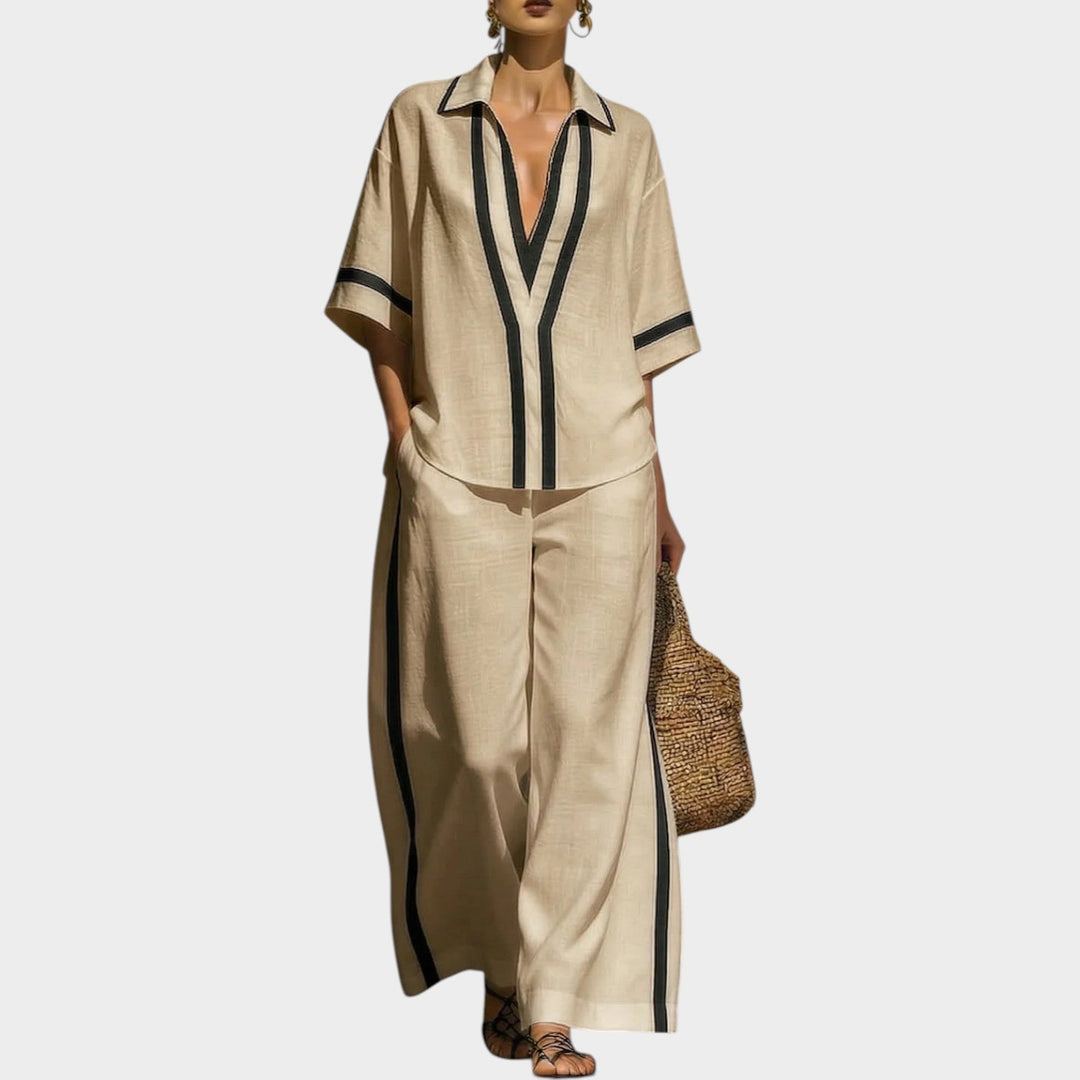 Full length shot of casual travel outfit featuring wide leg pants and matching top