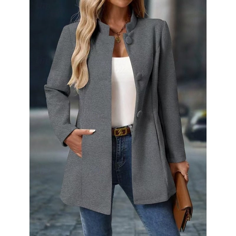 Back view of stylish women's winter trench coat with structured silhouette