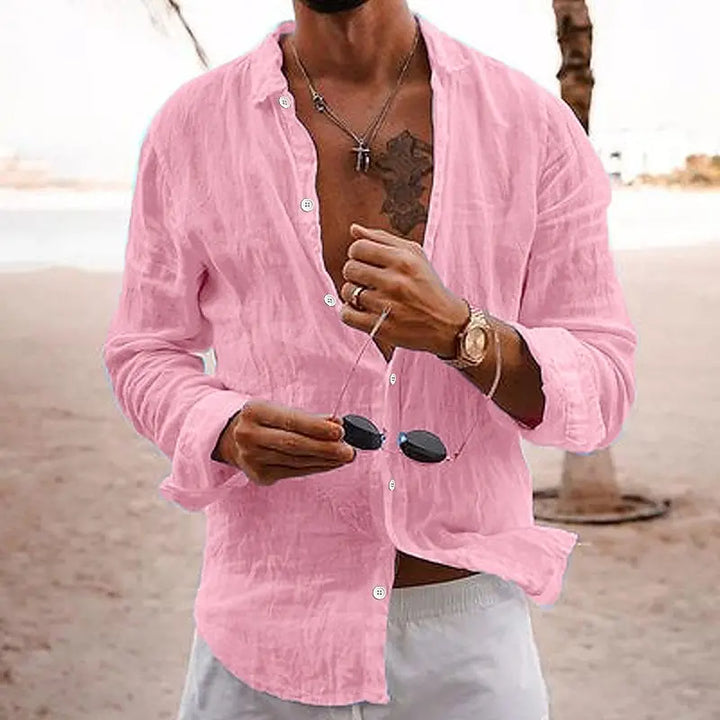 Full length shot of a man wearing a casual long sleeve collared shirt