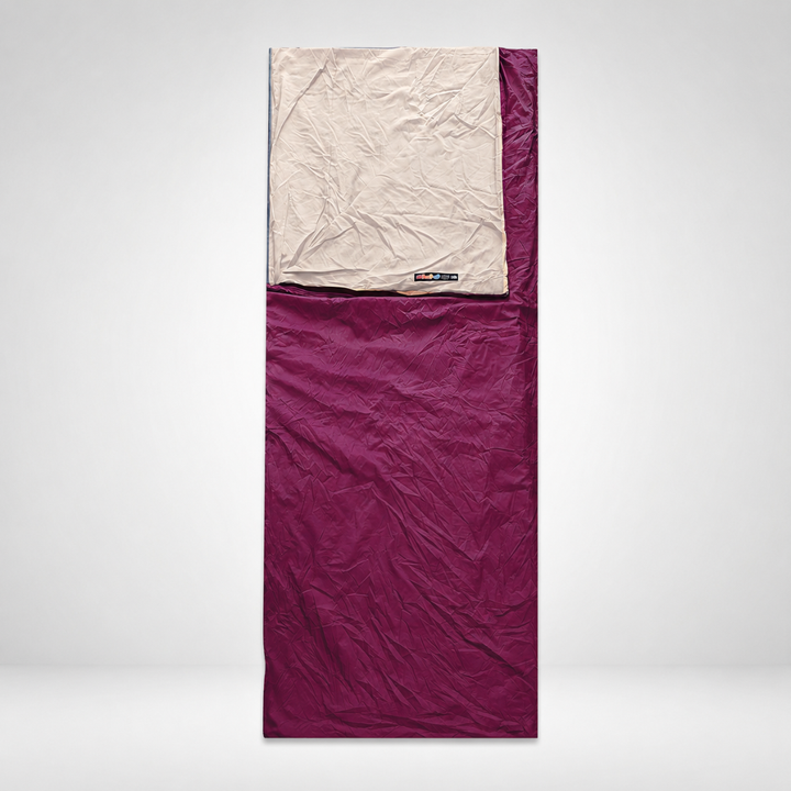 Violet portable rectangular sleep liner laid out flat with integrated pillowcase