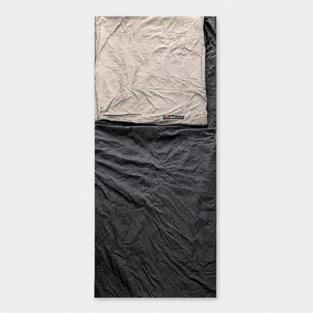 Travel sleep bag liner laid flat showing full rectangular dimensions