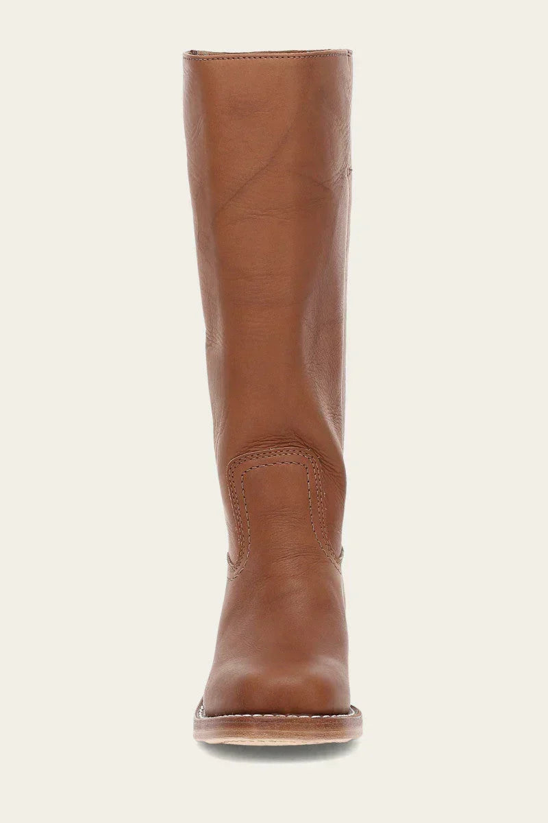 Close up of block heel on stylish women's tall boots footwear