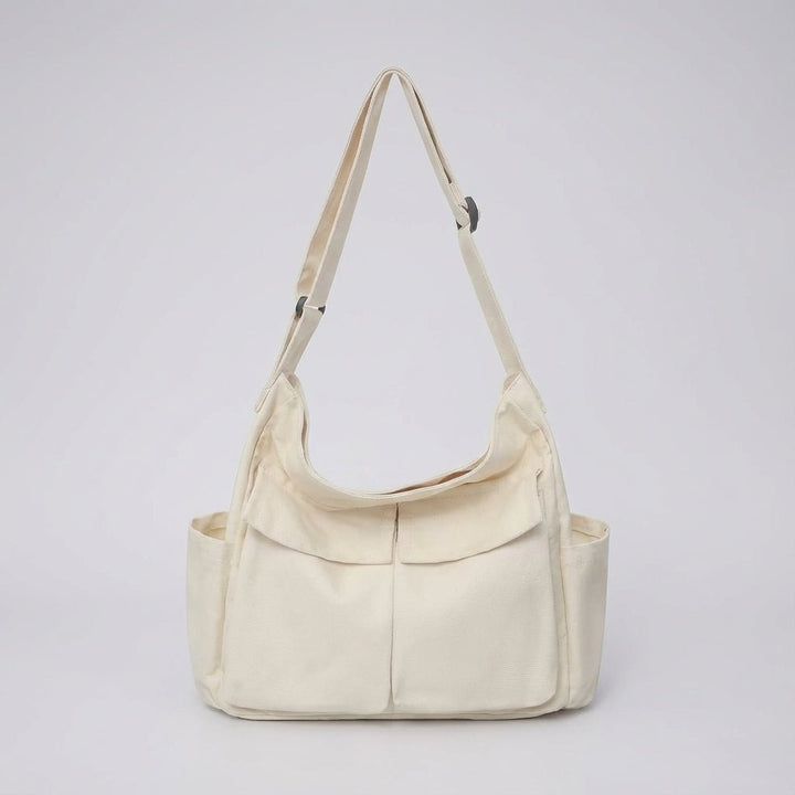 Close-up of durable metal hardware and zipper on travel canvas bag