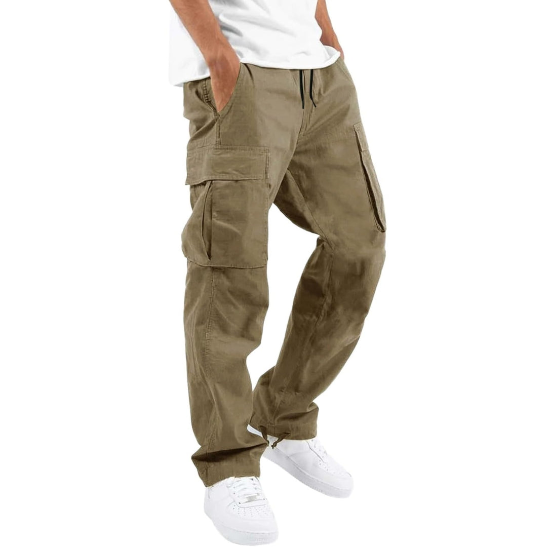 Man wearing khaki cargo trousers with spacious utility pockets and casual streetwear styling