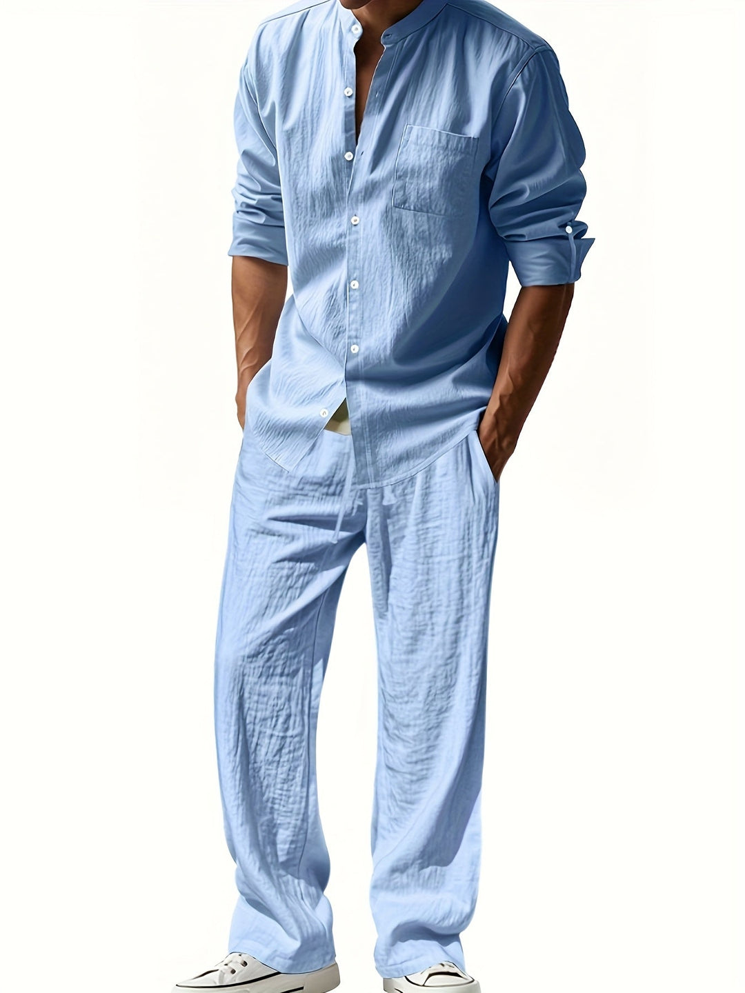 Textured fabric detail of men's long sleeve shirt and trousers set
