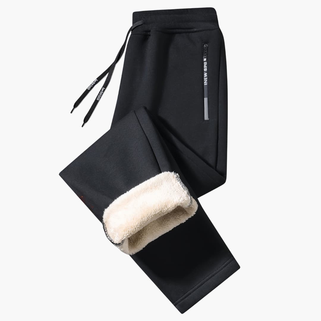 Black men's casual fleece-lined joggers folded with drawstring and zip pocket visible