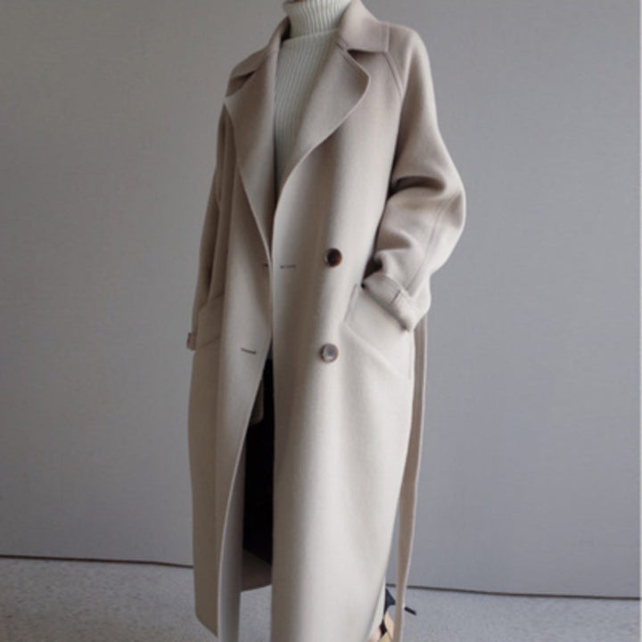 Close-up of Isabella beige winter coat silhouette and buttons