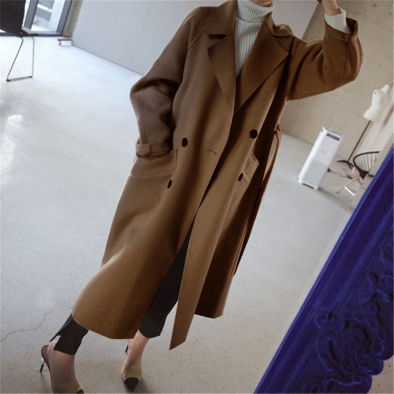 Interior lining and brand tag detail inside the women's stylish winter fashion outerwear.