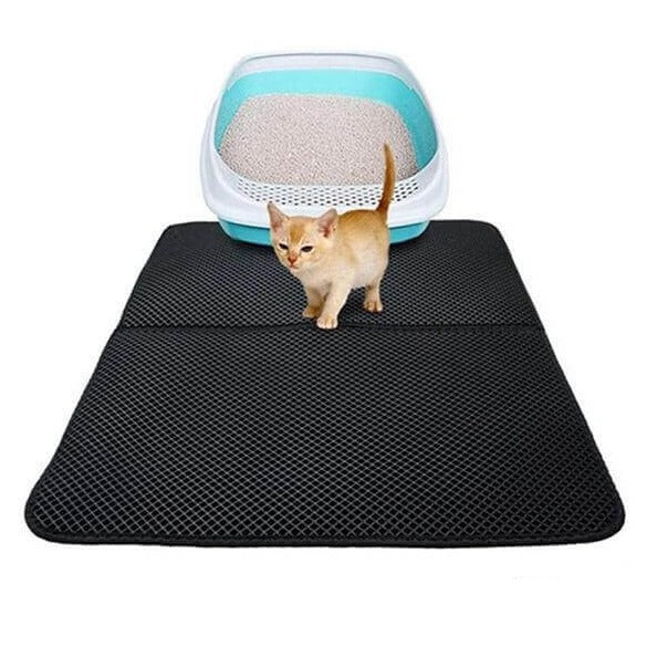 Folded waterproof cat litter mat showcasing easy storage and cleaning