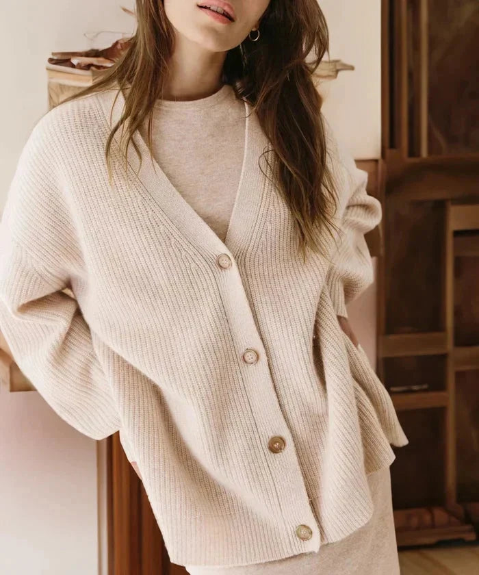 Knitwear layering vest for women showing detailed button closure