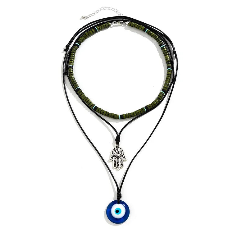 Unisex 3-layer symbolic necklace set displayed flat