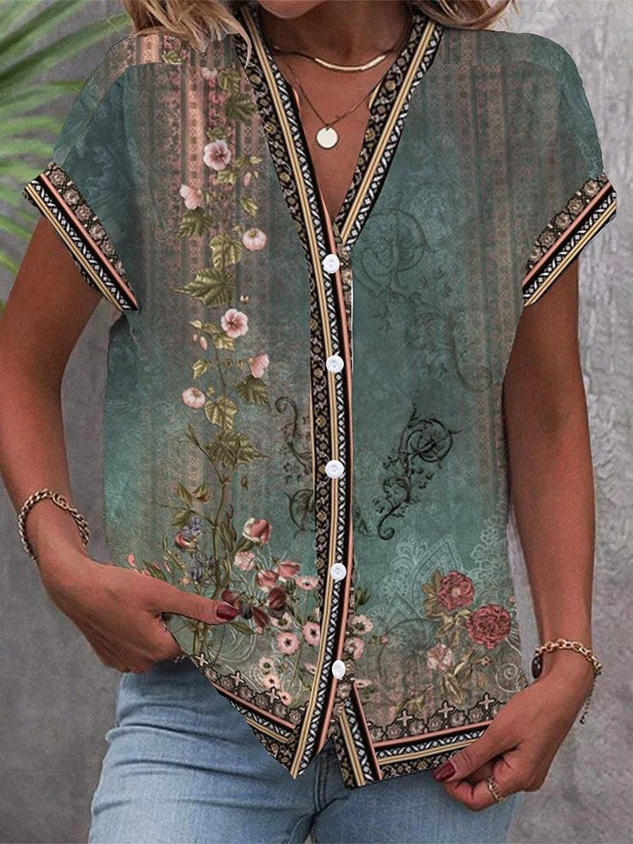 Women's green floral print V-neck short sleeve blouse top front view