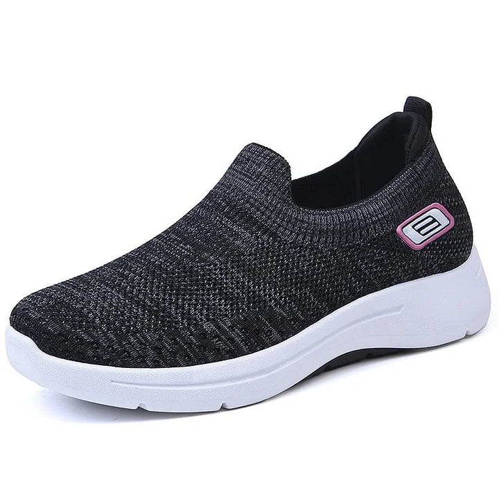 Back view of women's sports footwear highlighting heel cushioning and stability