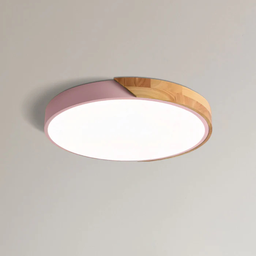 Pink Scandinavian wooden LED ceiling light adding a soft splash of color