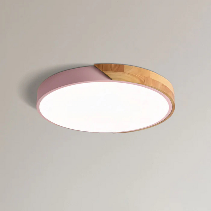 Pink Scandinavian wooden LED ceiling light adding a soft splash of color