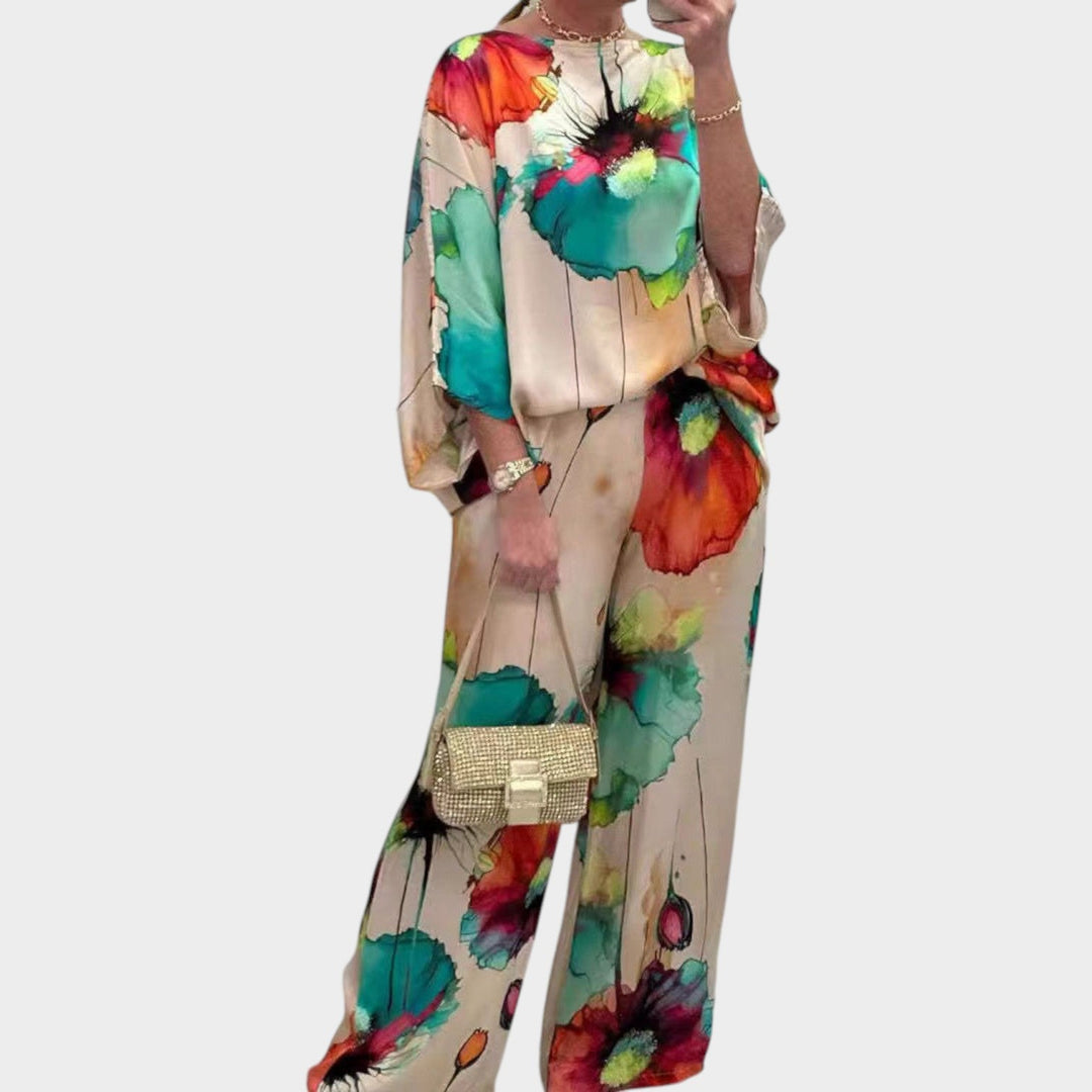 Womens floral two-piece matching set featuring a stylish top and wide leg pants for casual wear.