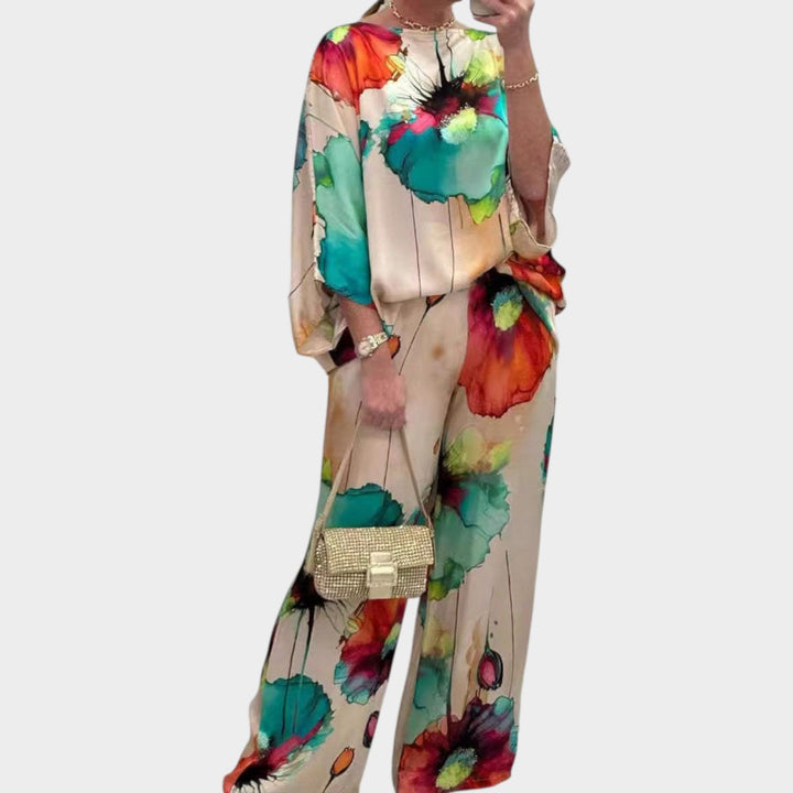 Womens floral two-piece matching set featuring a stylish top and wide leg pants for casual wear.