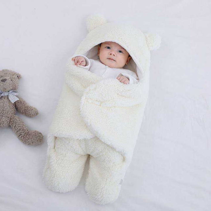 Infant wrap sleep sack featuring cute bear hood in warm caramel