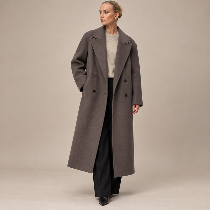 Model wearing a stylish brown oversized long coat from the front