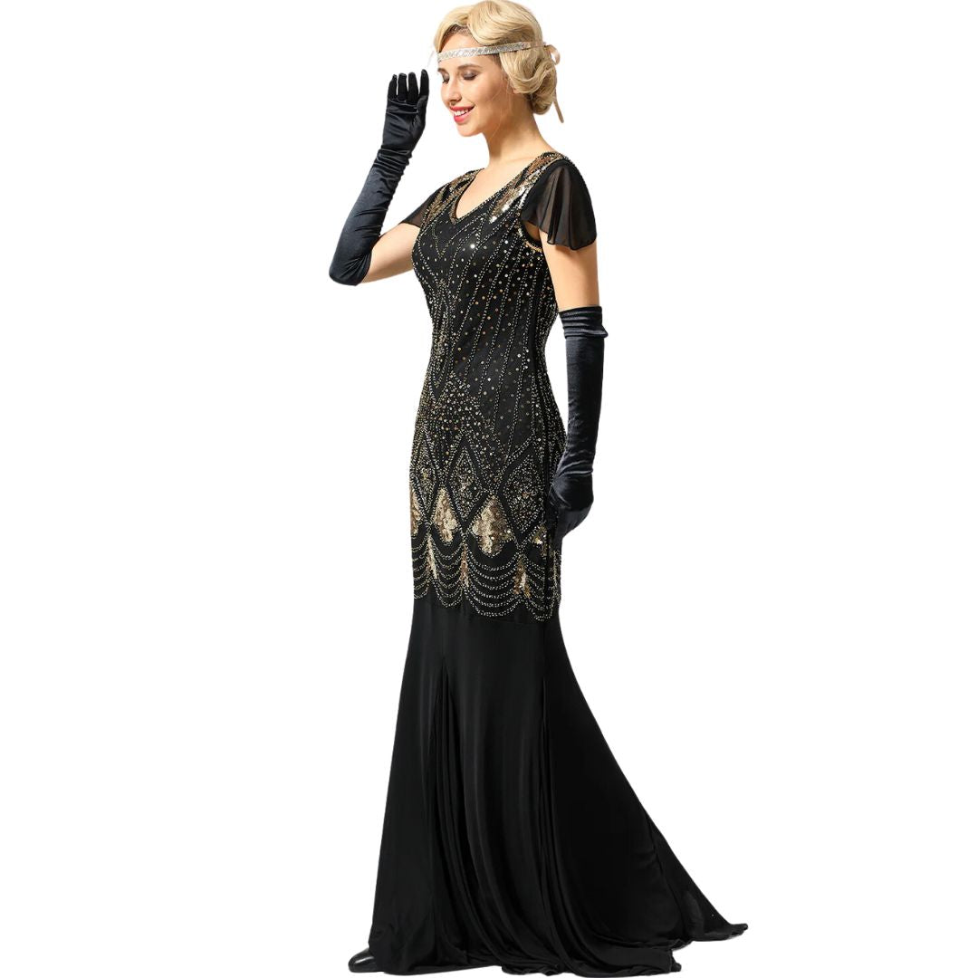 Model walking in glamorous 1920s flapper evening gown and gala dress