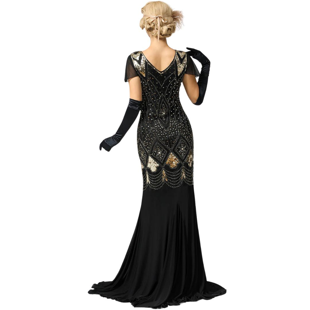 Stylized flat lay of the 1920s sequin flapper dress with evening accessories