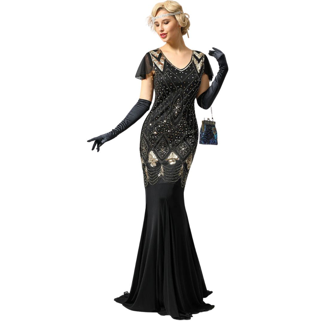 Model wearing a black and gold sequined 1920s flapper dress with gloves and headband