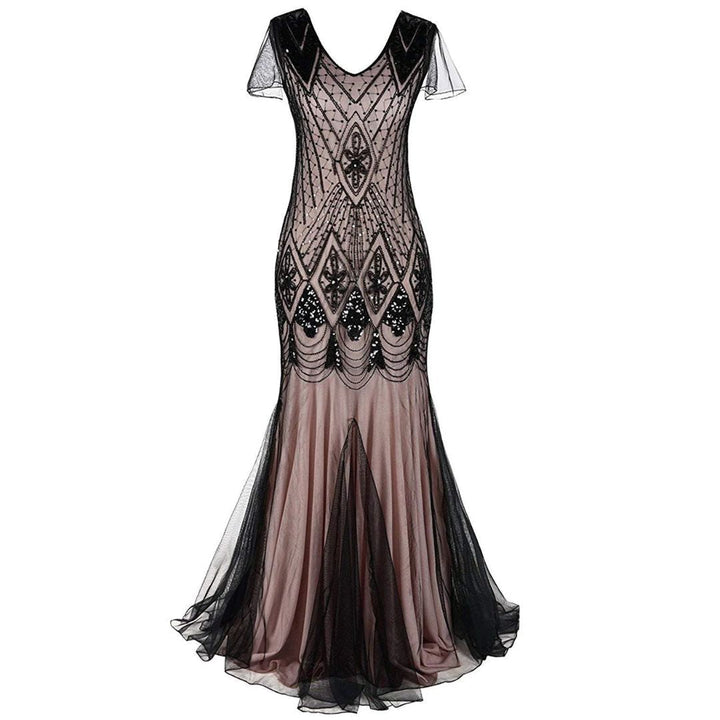 Mannequin display of a pink and black detailed vintage flapper dress
