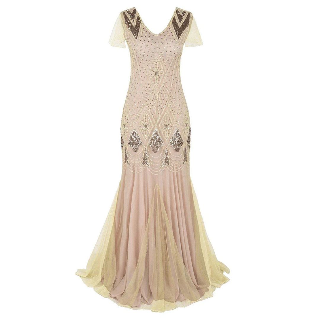 Close up of intricate beadwork and sequins on the 1920s flapper dress party gown
