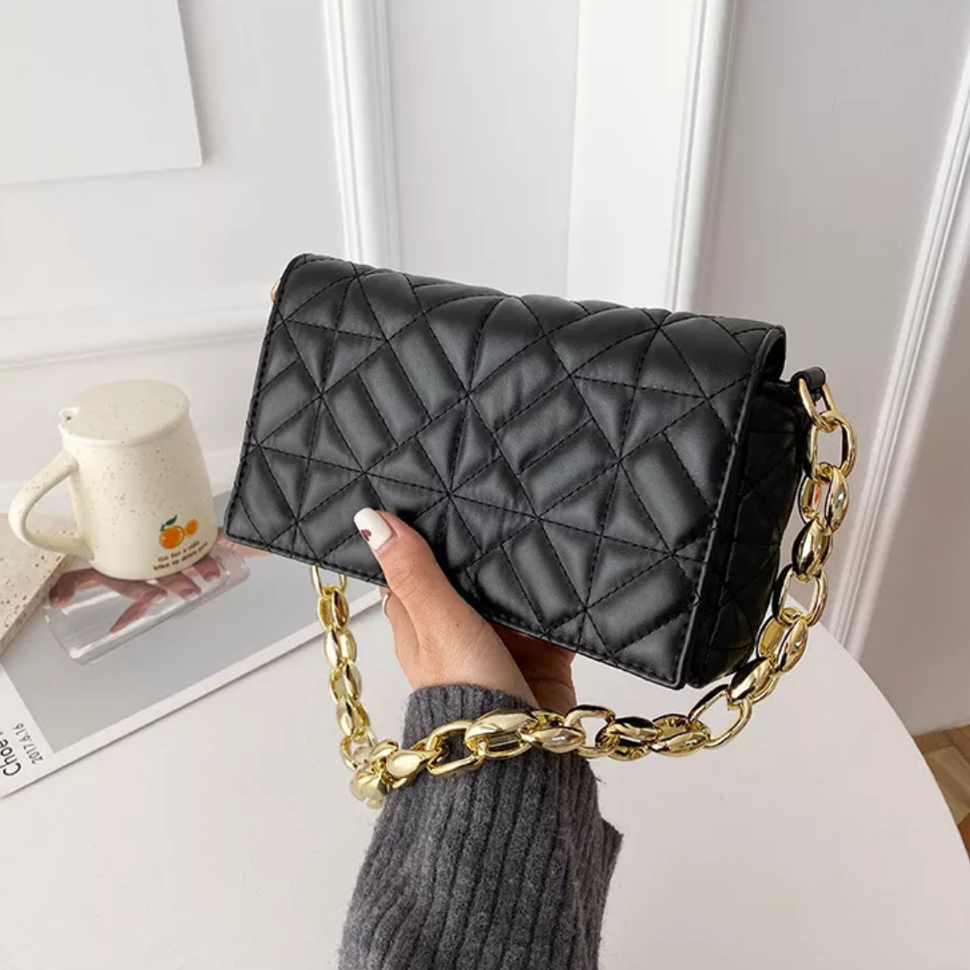Stylish flap bag in green jacquard fabric with clasp detail